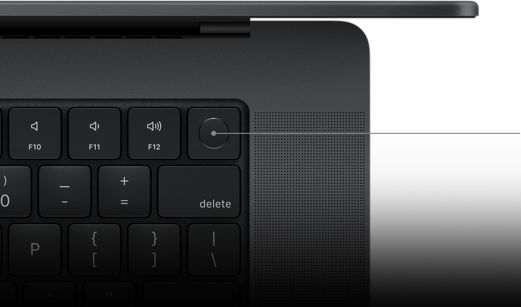 Pointer showing the Touch ID key on the Magic Keyboard.